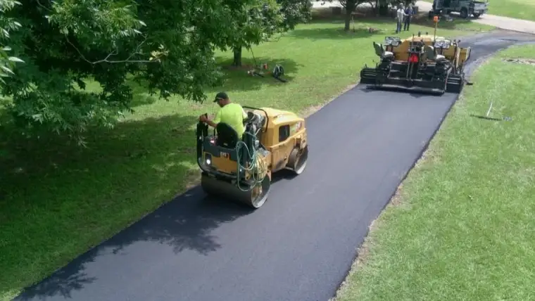 Driveway paving crew at work